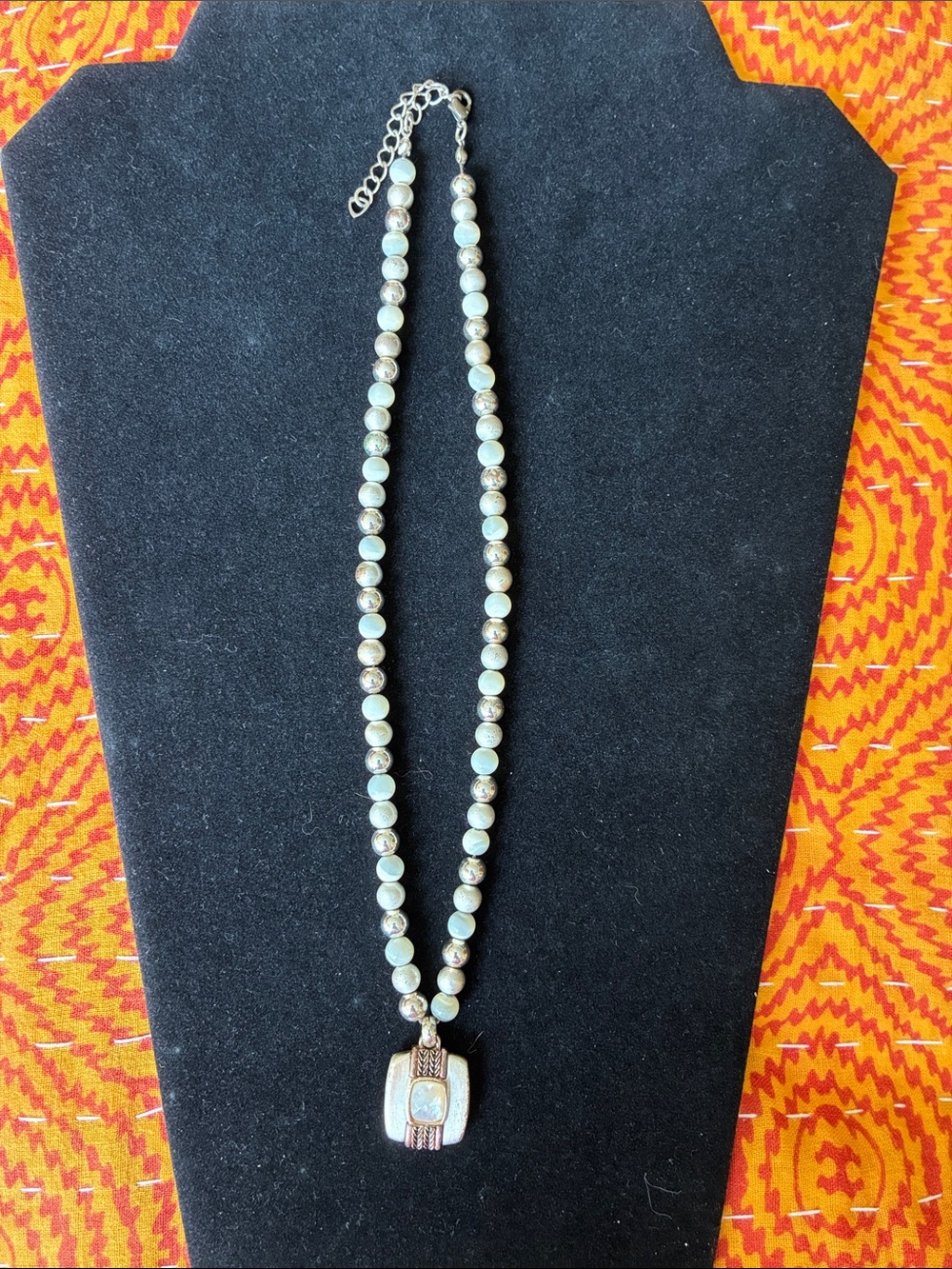 Liz Claiborne mother of pearl pendant
